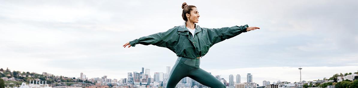 Woman doing yoga outside.