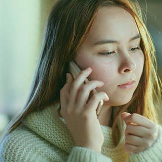 Young woman making a phone call